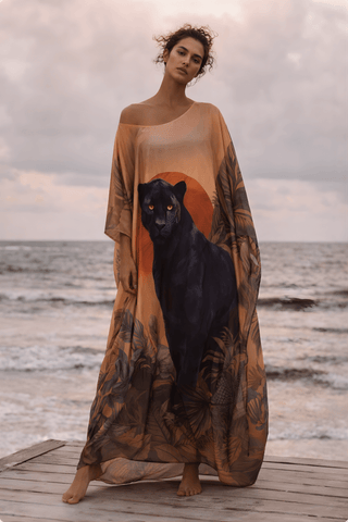 Luxury black panther kaftan worn at the beach, lightweight resort wear and beach cover-up