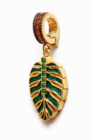 Side view of Jungle Leaf Charm, gold-plated sterling silver clip charm with garnets and tsavorite