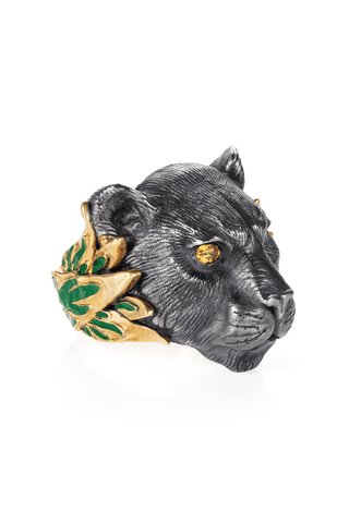 Decorative wall hook shaped like a panther head with green leaves on a white background